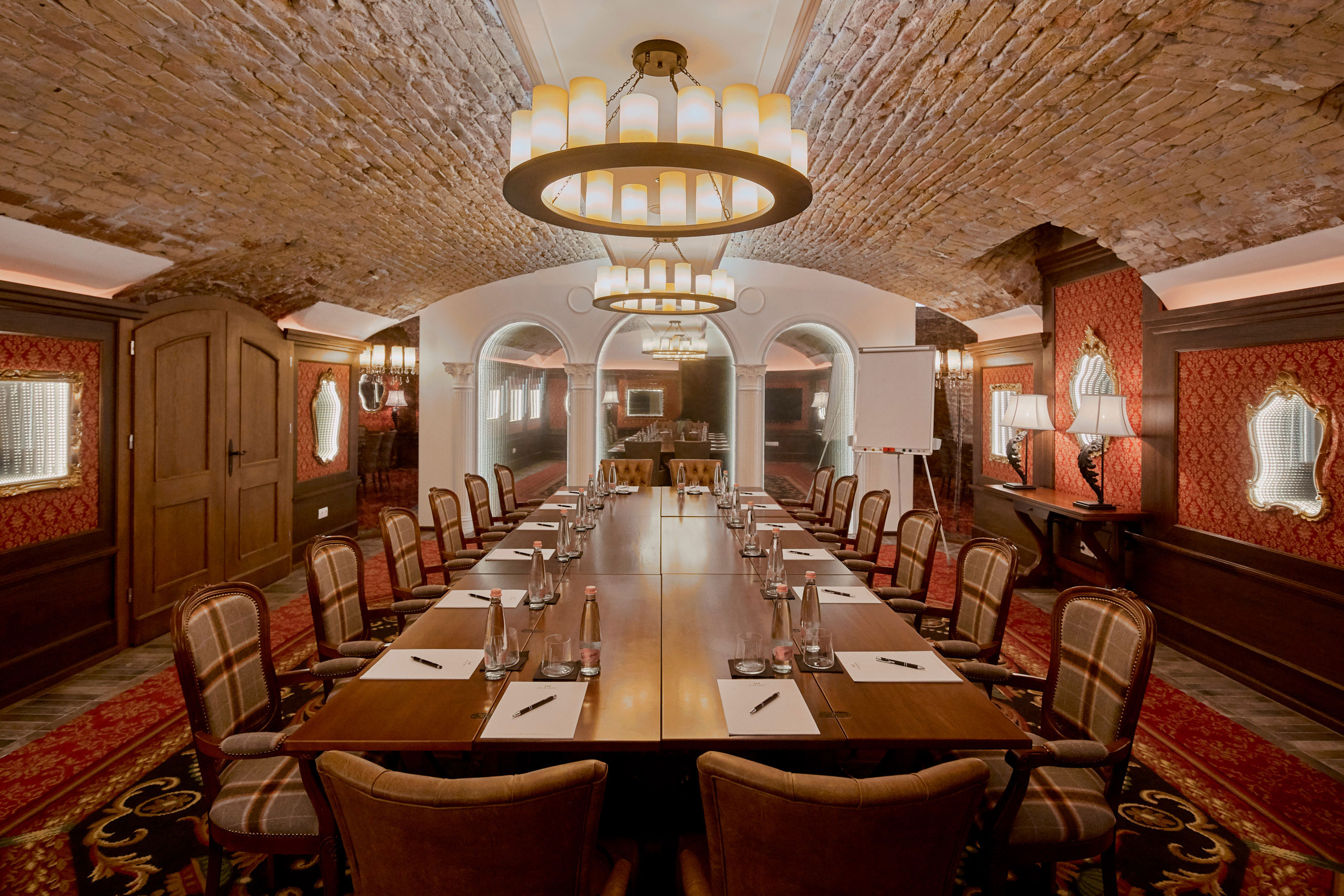 a conference room with a long table and chairs