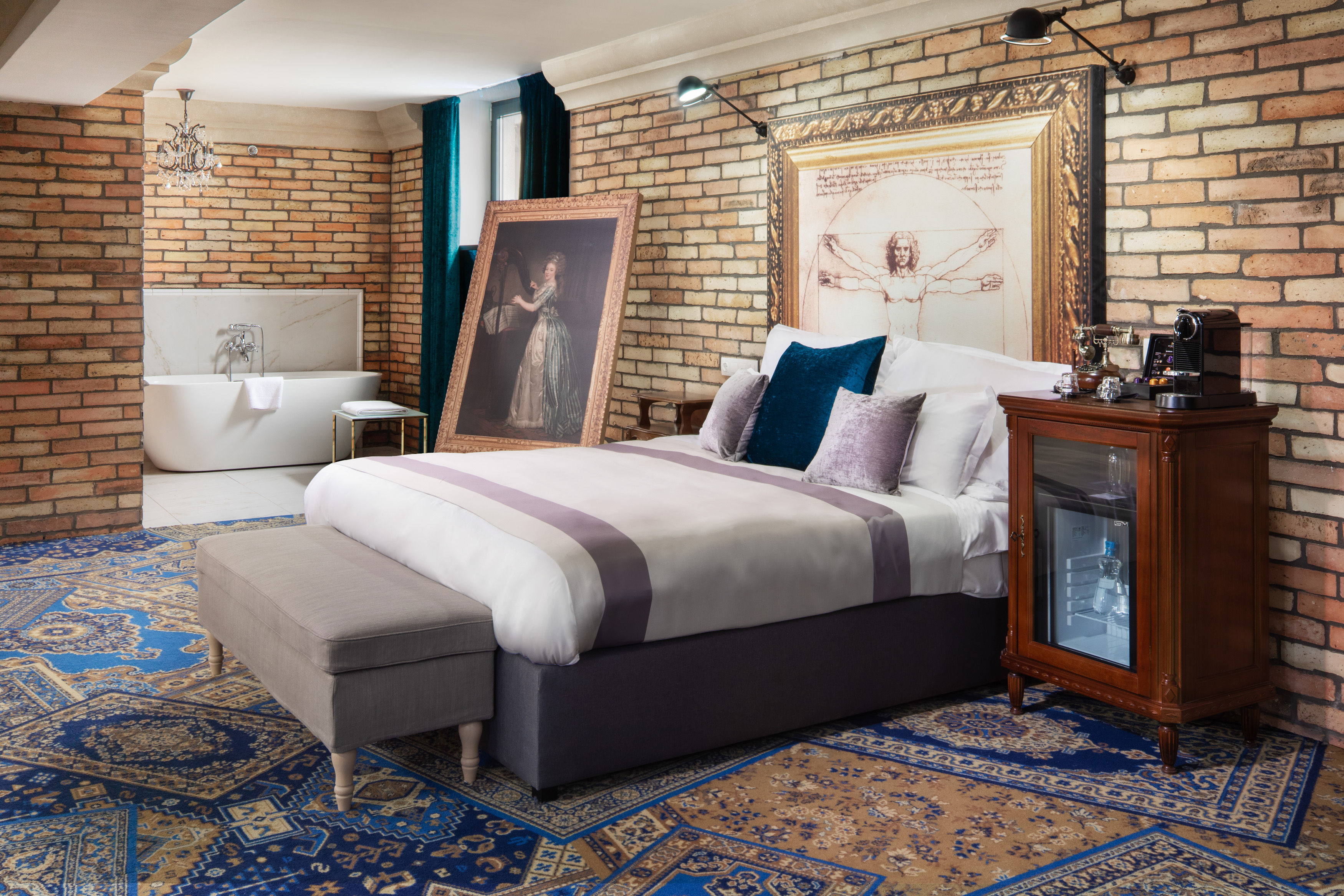a bedroom with a bed and a bathtub