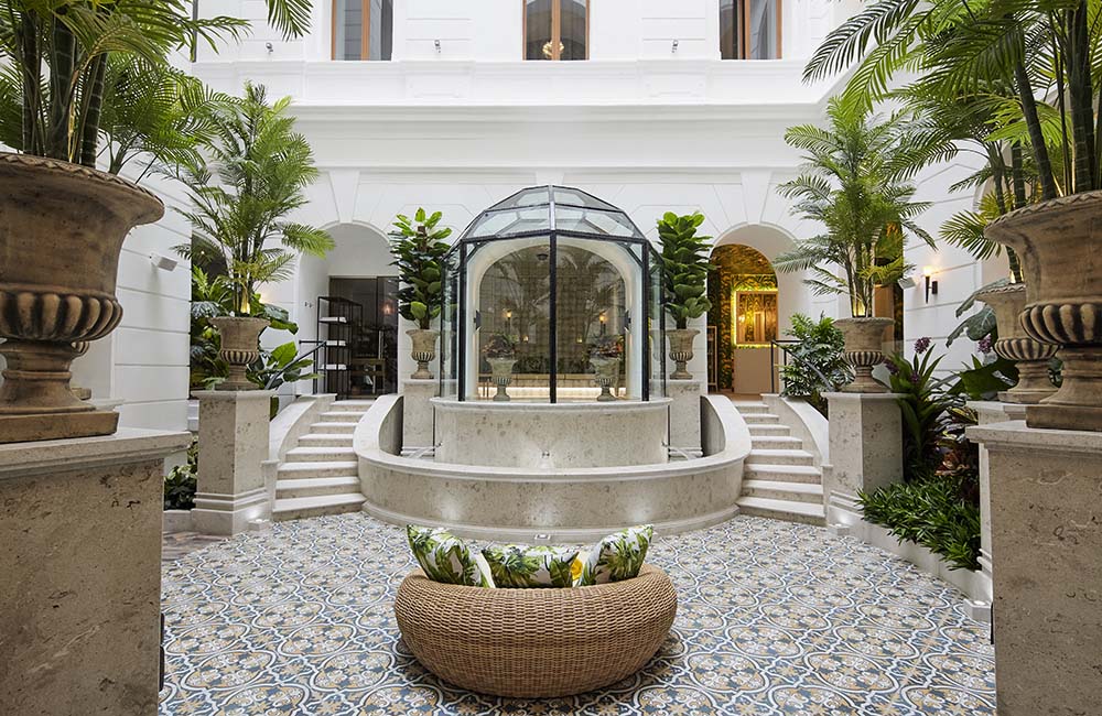 a glass dome in a courtyard