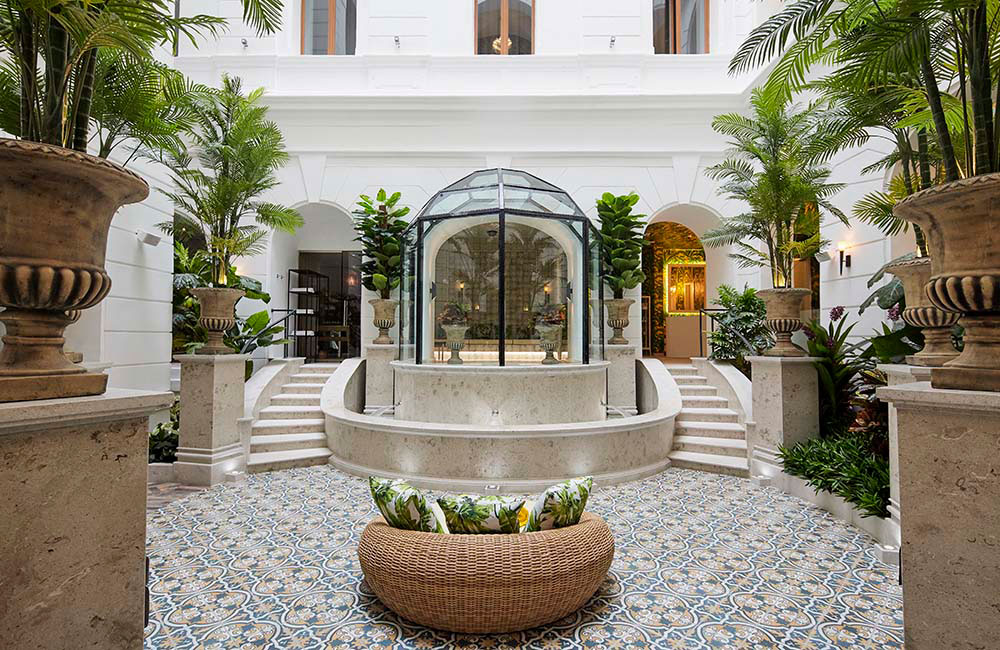 a glass dome in a courtyard