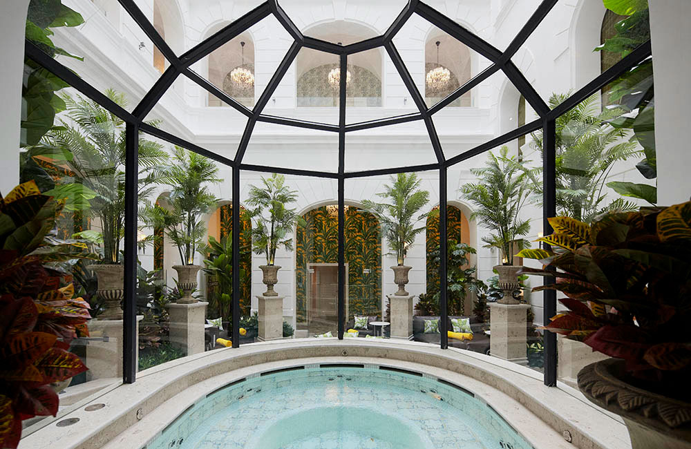a indoor hot tub with a glass dome
