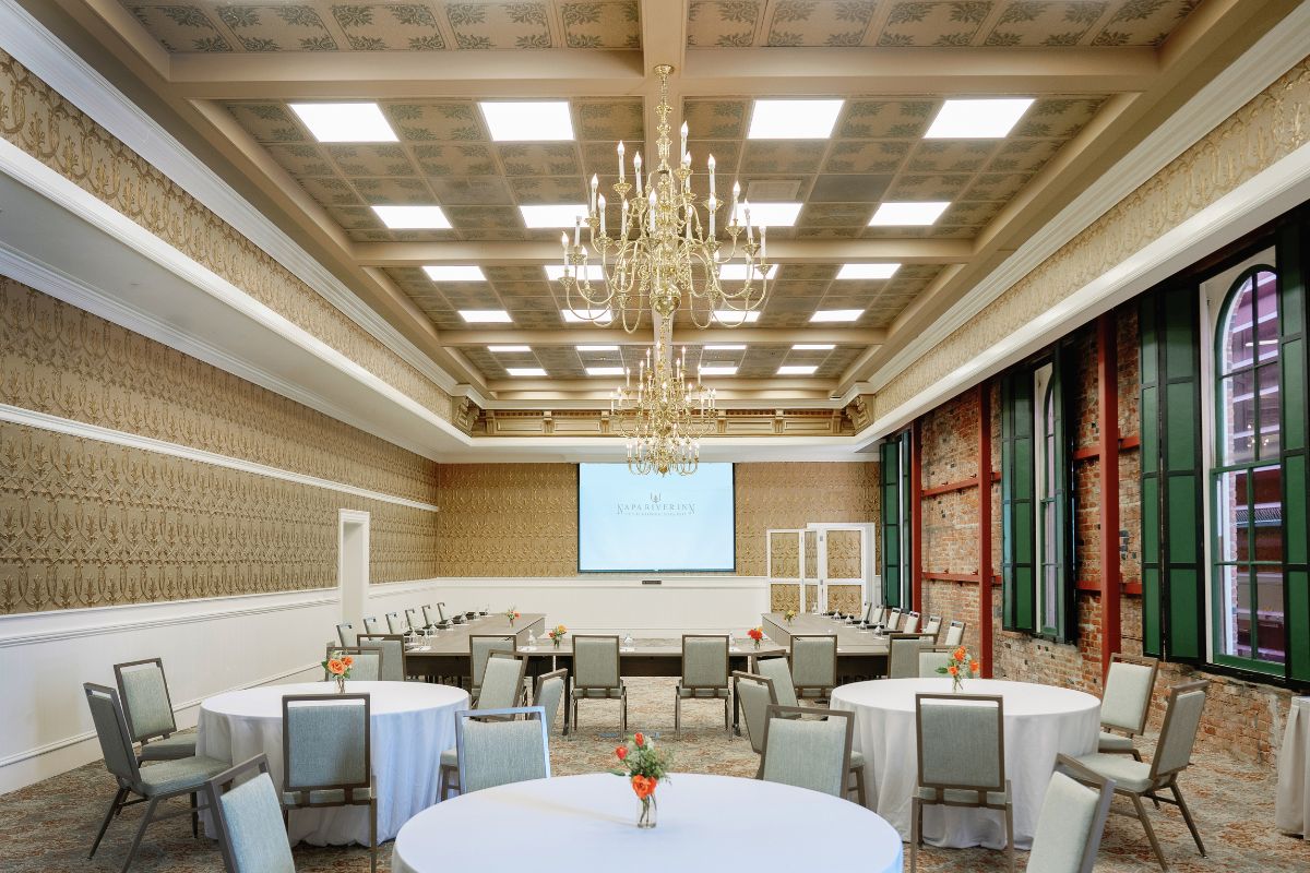 a room with tables and chairs