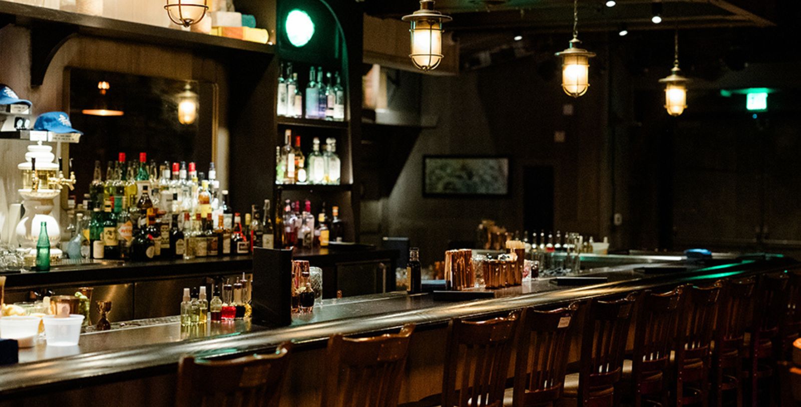 a bar with bottles of alcohol