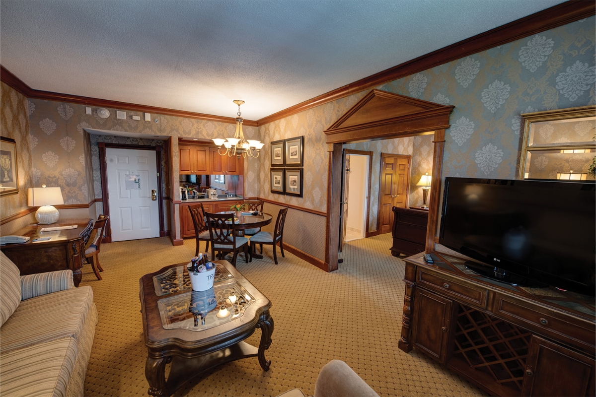 a room with a television and a table