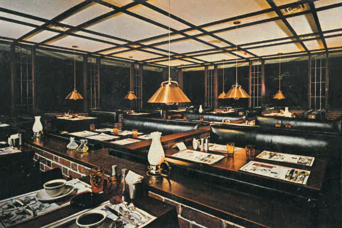 a restaurant with tables and chairs