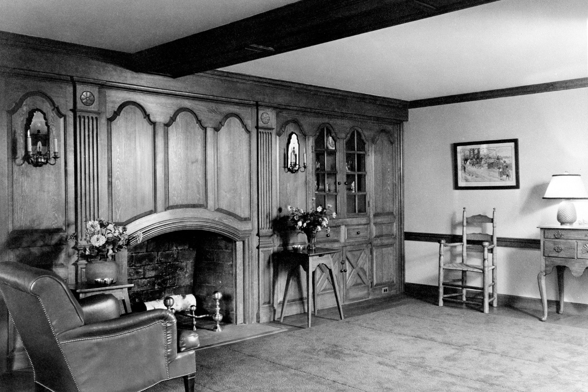 a room with a fireplace and furniture