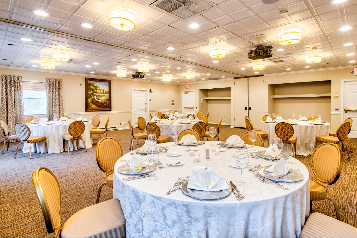 a room with tables and chairs