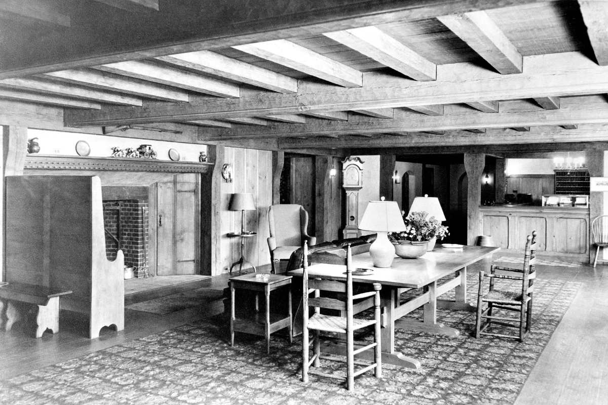 a room with a table and chairs