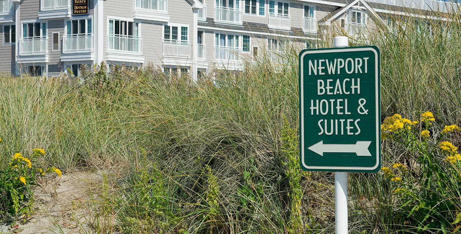 a sign in front of a hotel