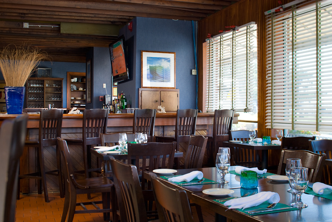 a restaurant with tables and chairs