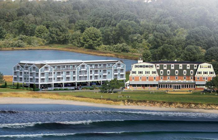 a large building next to a body of water