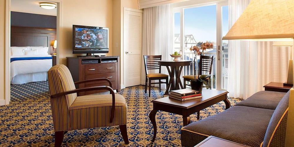 a living room with a television and a table