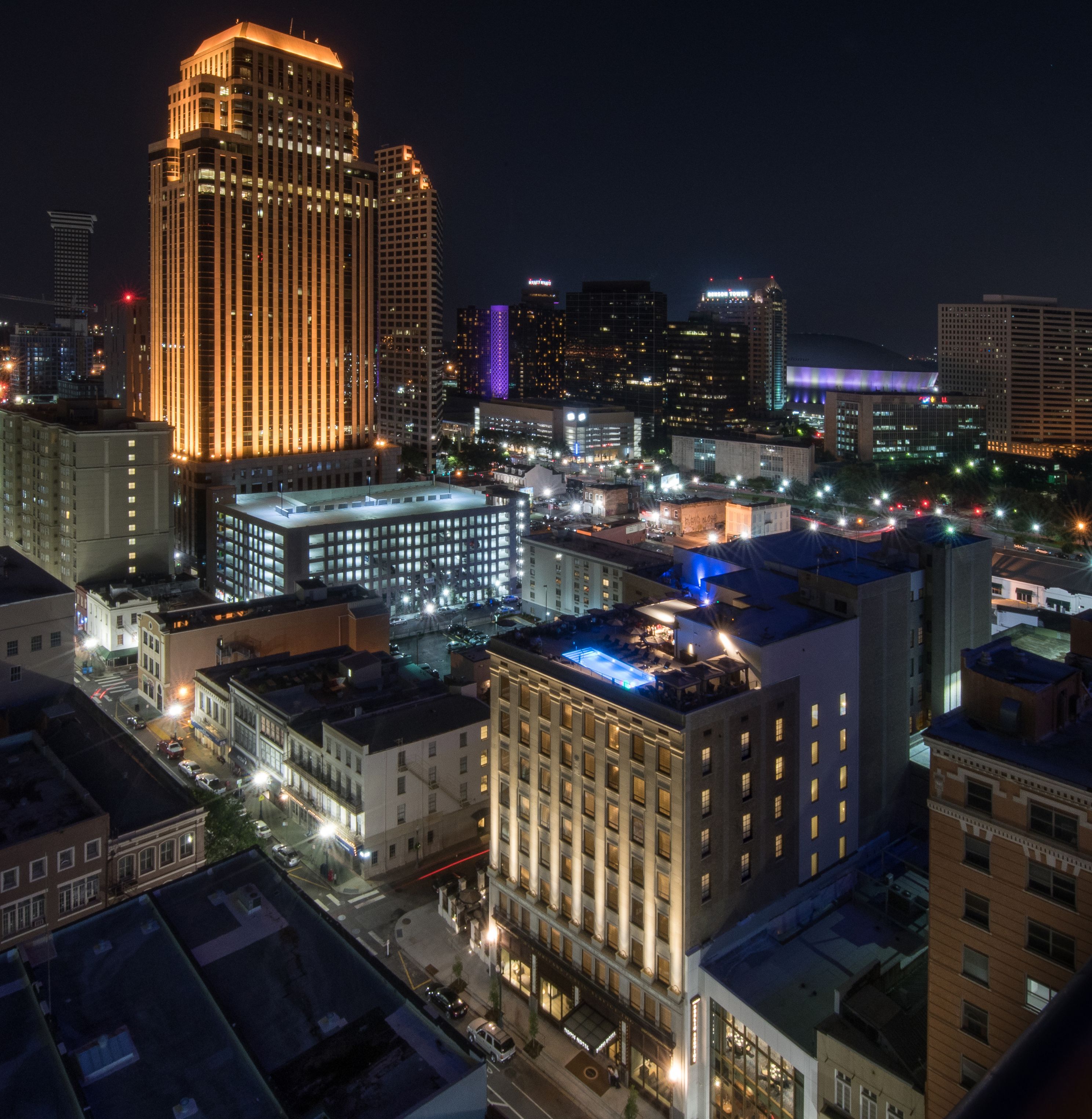 a city at night with many buildings