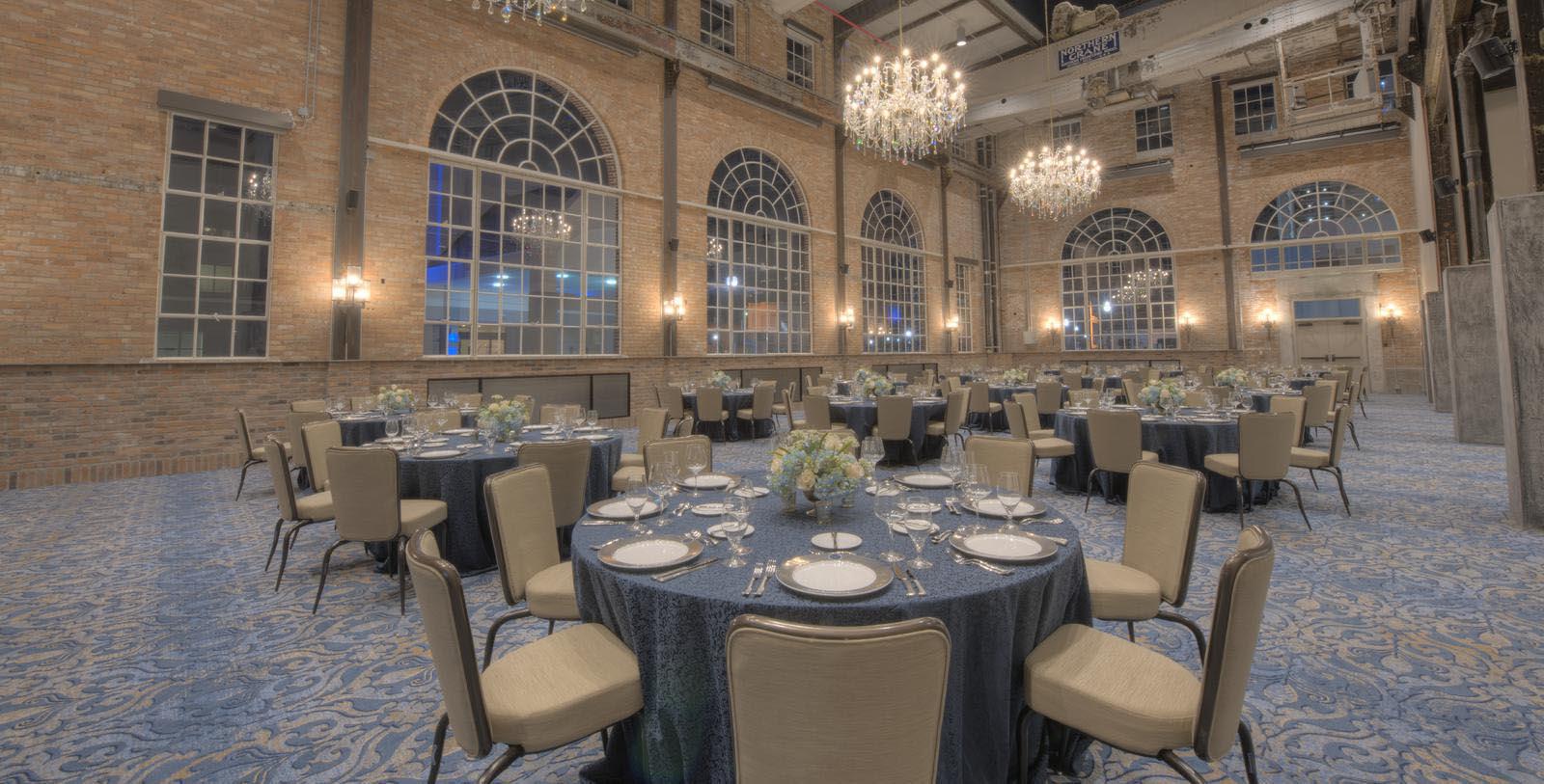 a large room with tables and chairs