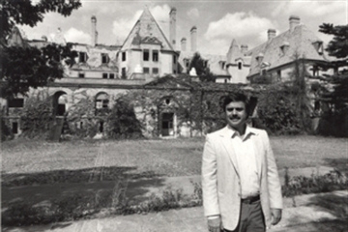 a man standing in front of a building