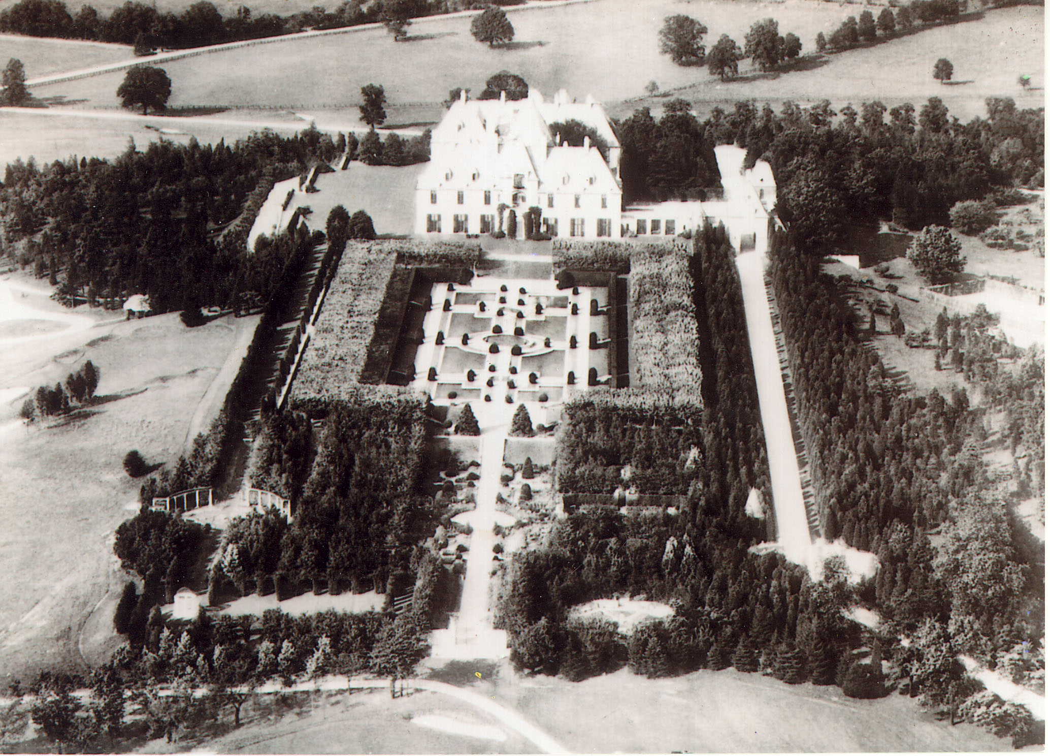 an aerial view of a large mansion