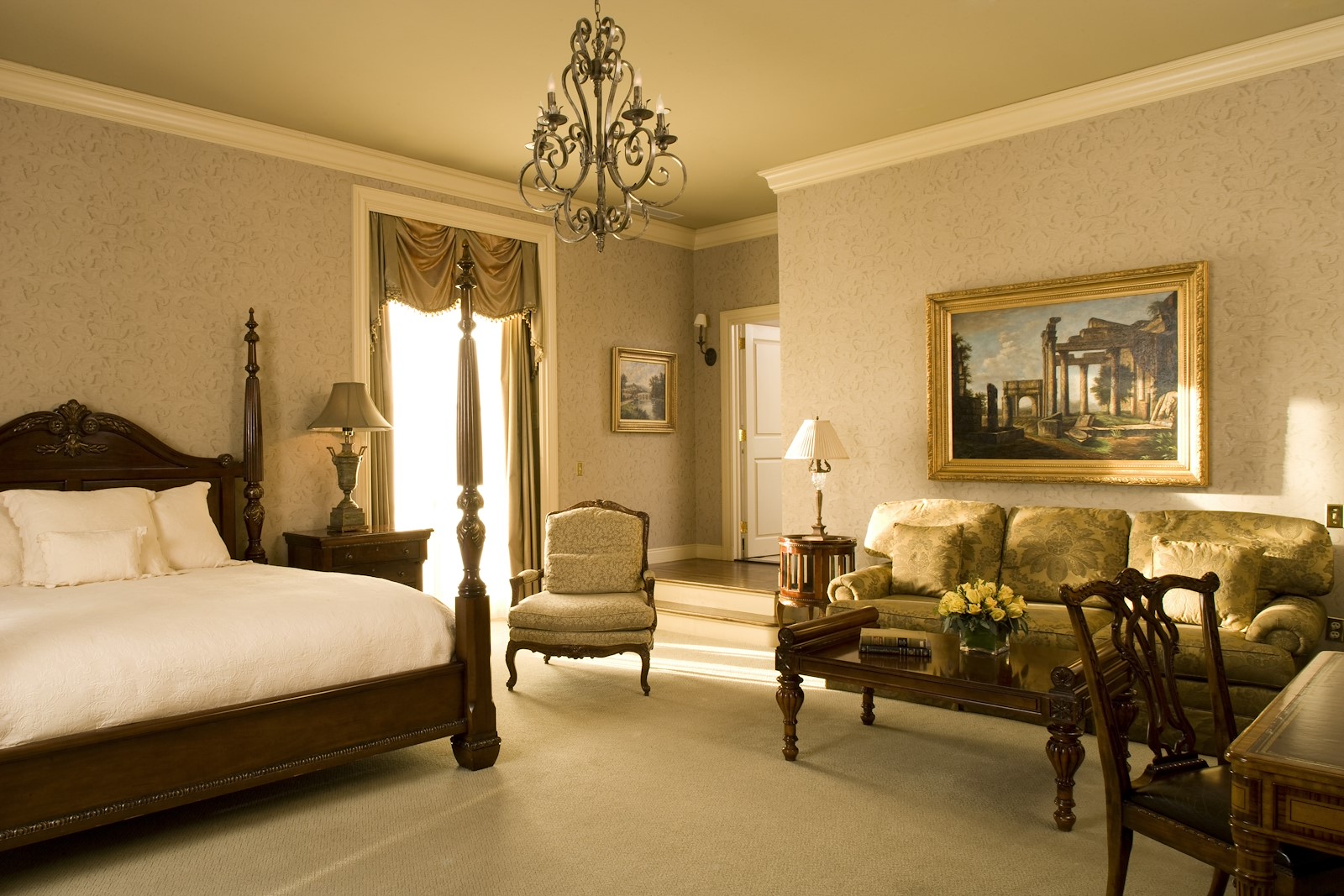a bedroom with a bed and a couch