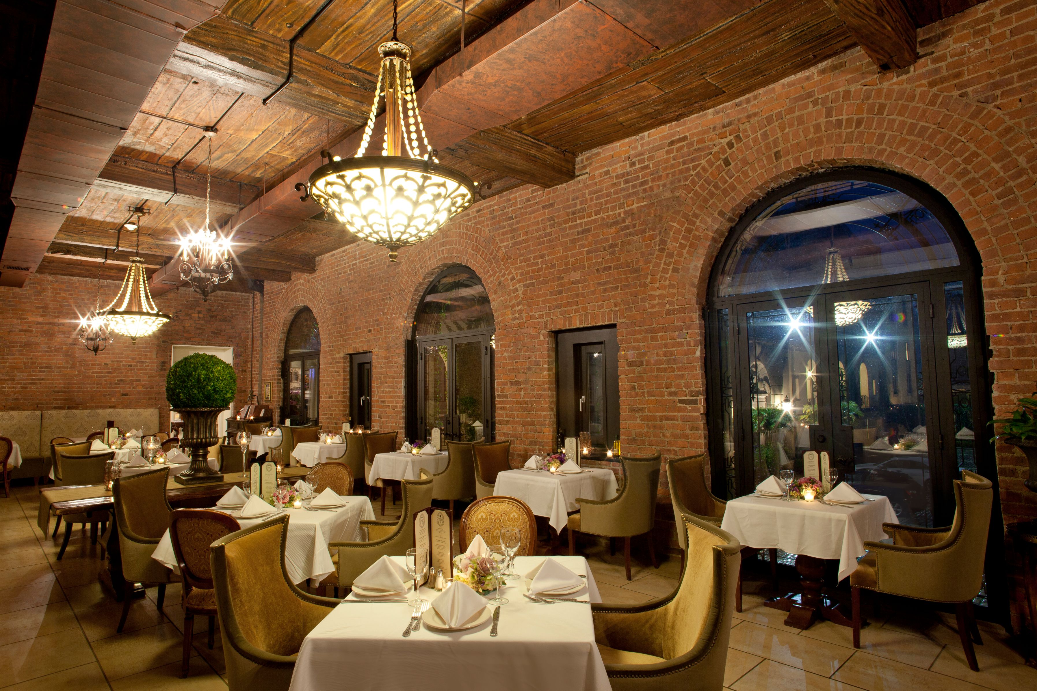 a restaurant with tables and chairs