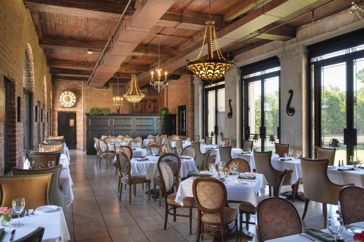 a room with tables and chairs