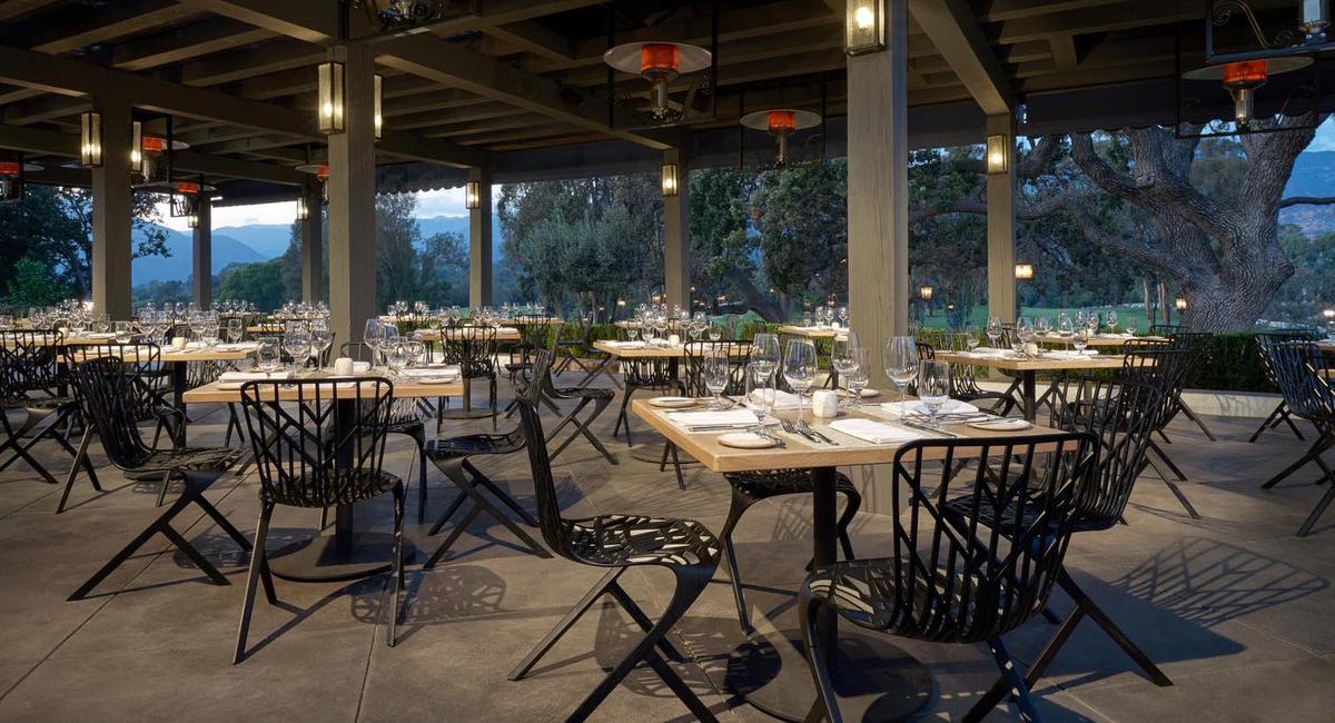 a restaurant with tables and chairs