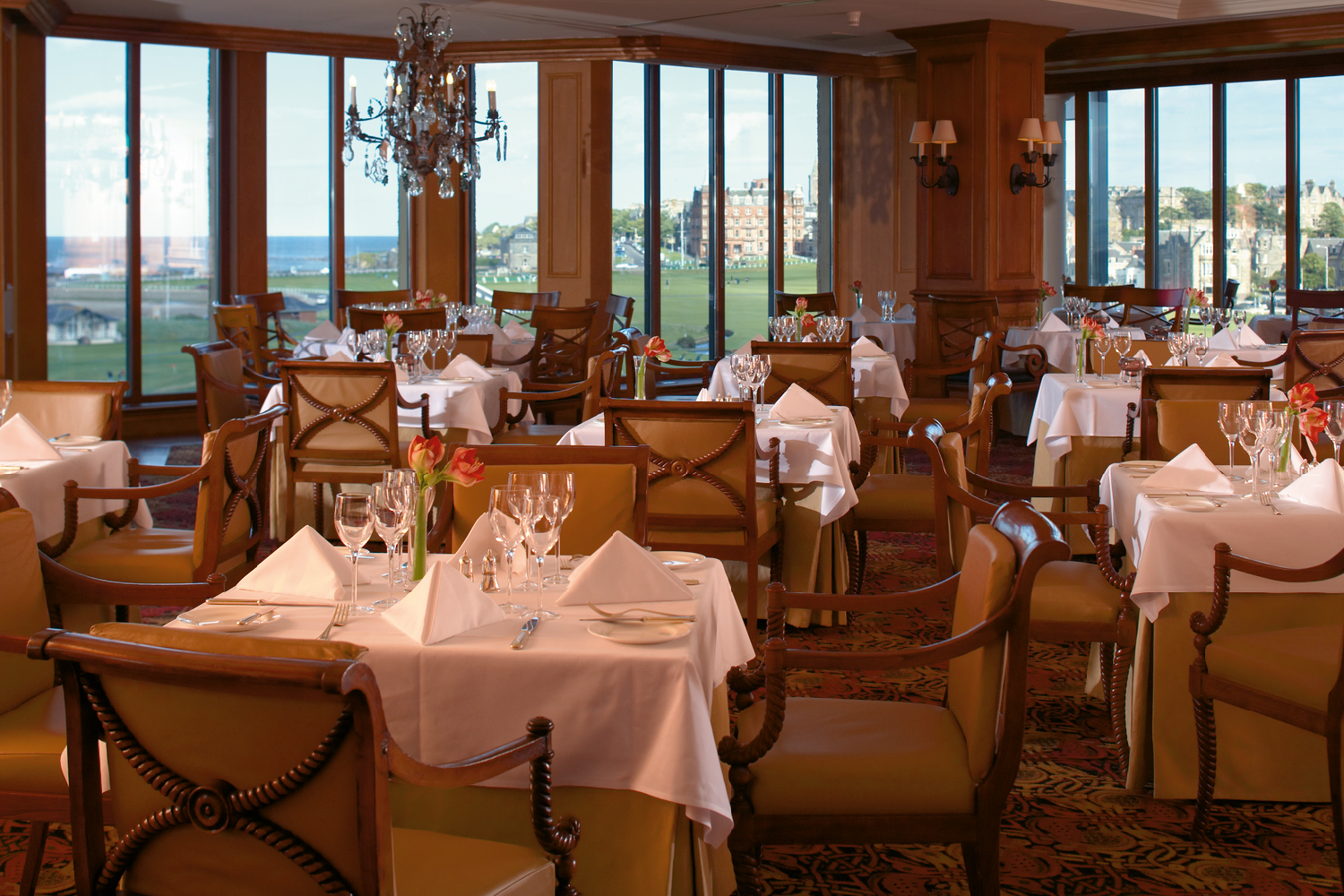 a restaurant with tables and chairs