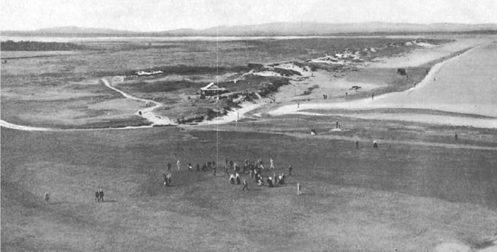 a group of people on a beach