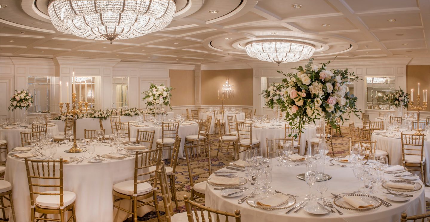 a large banquet hall with tables and chairs