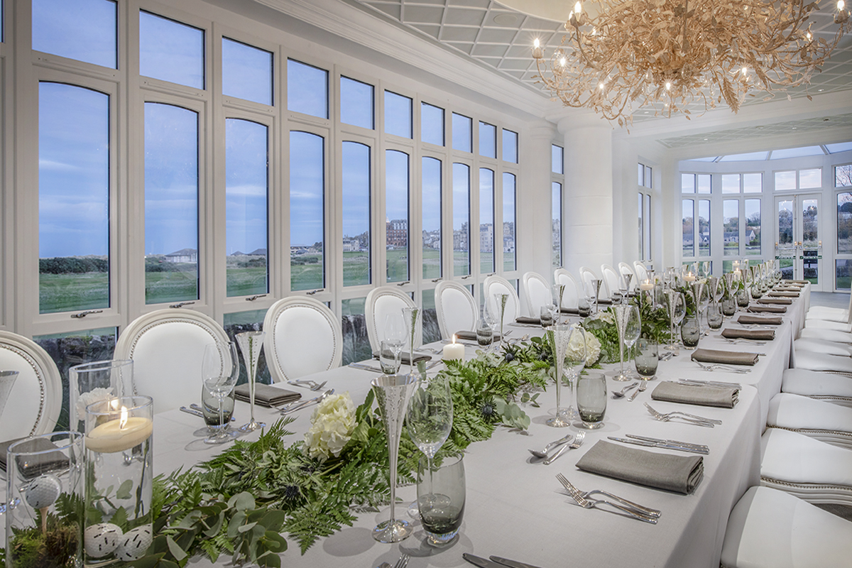 a long table set for a dinner party