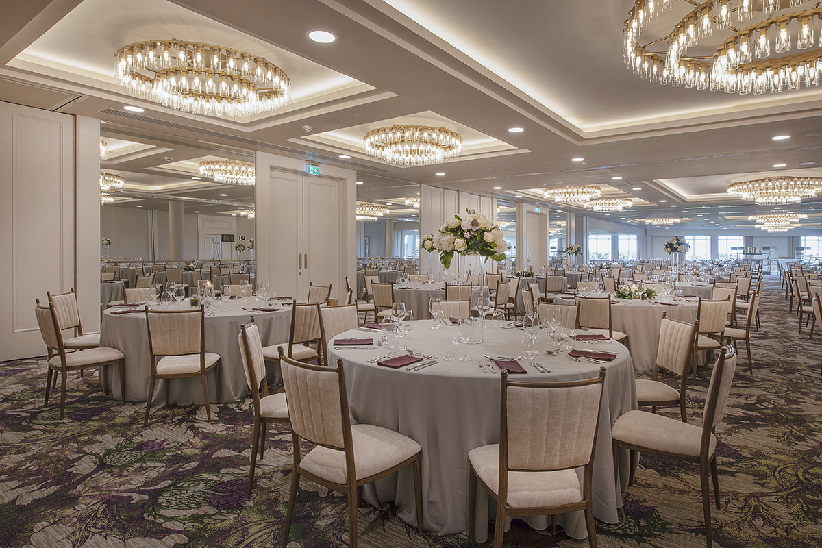 a large room with tables and chairs