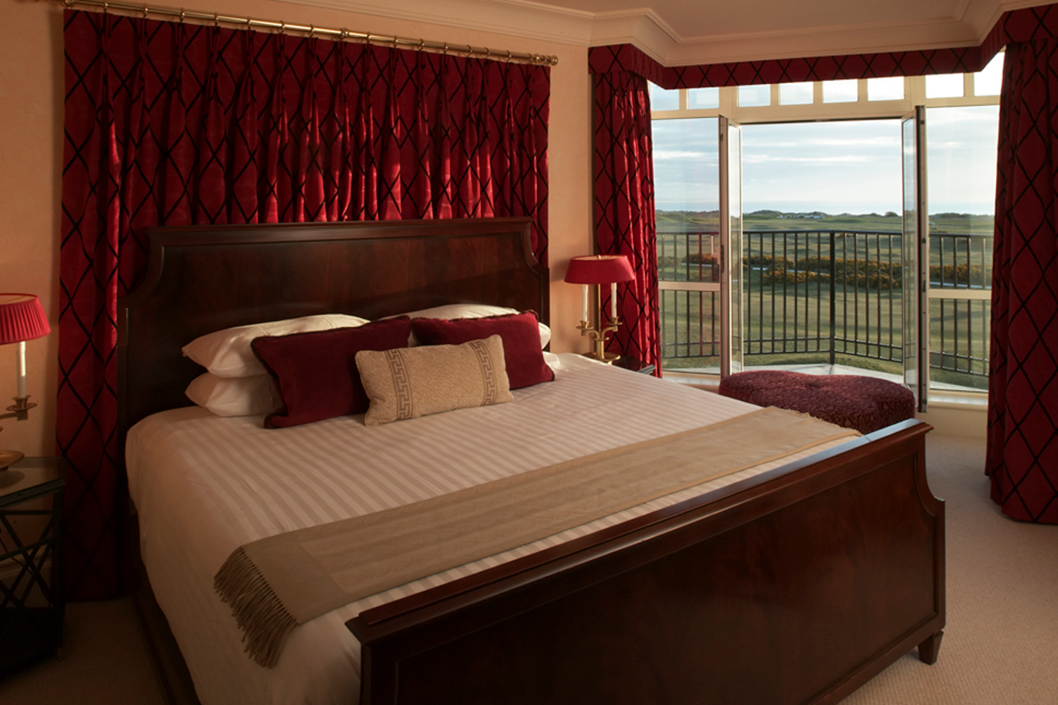image of deluxe suite bedroom old course hotel golf resort and spa st_ andrews united kingdom_high