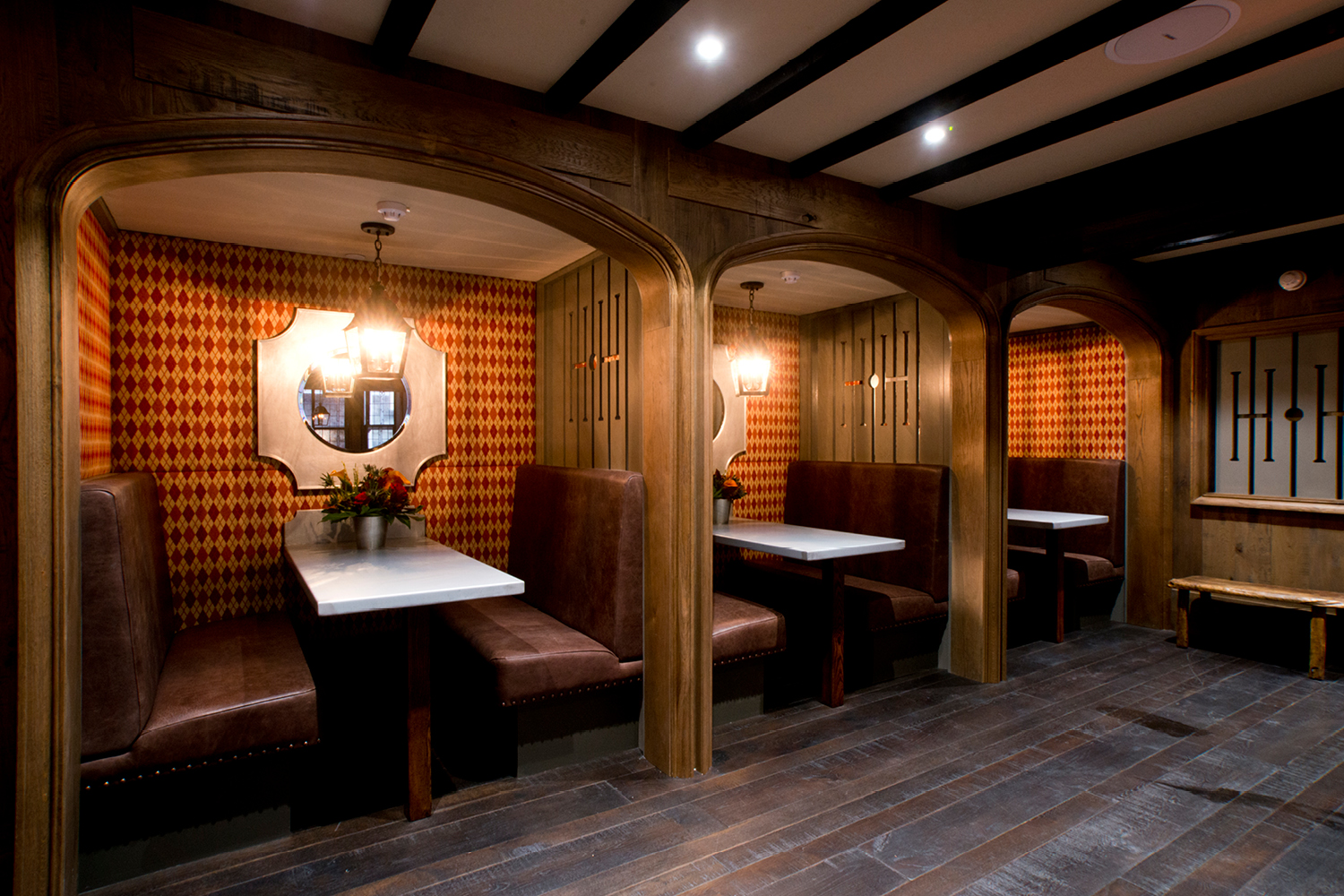 a room with tables and benches
