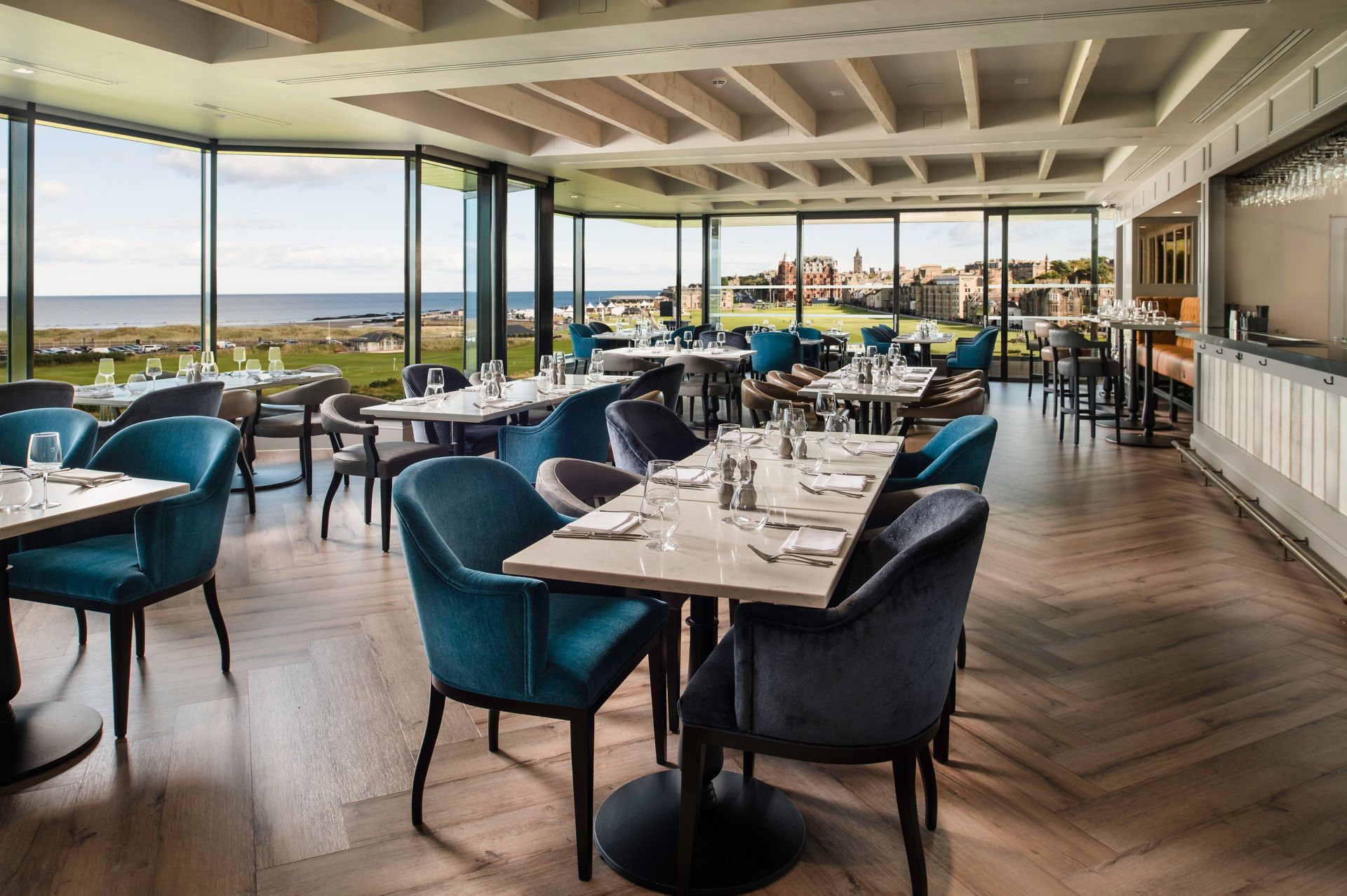 a restaurant with tables and chairs