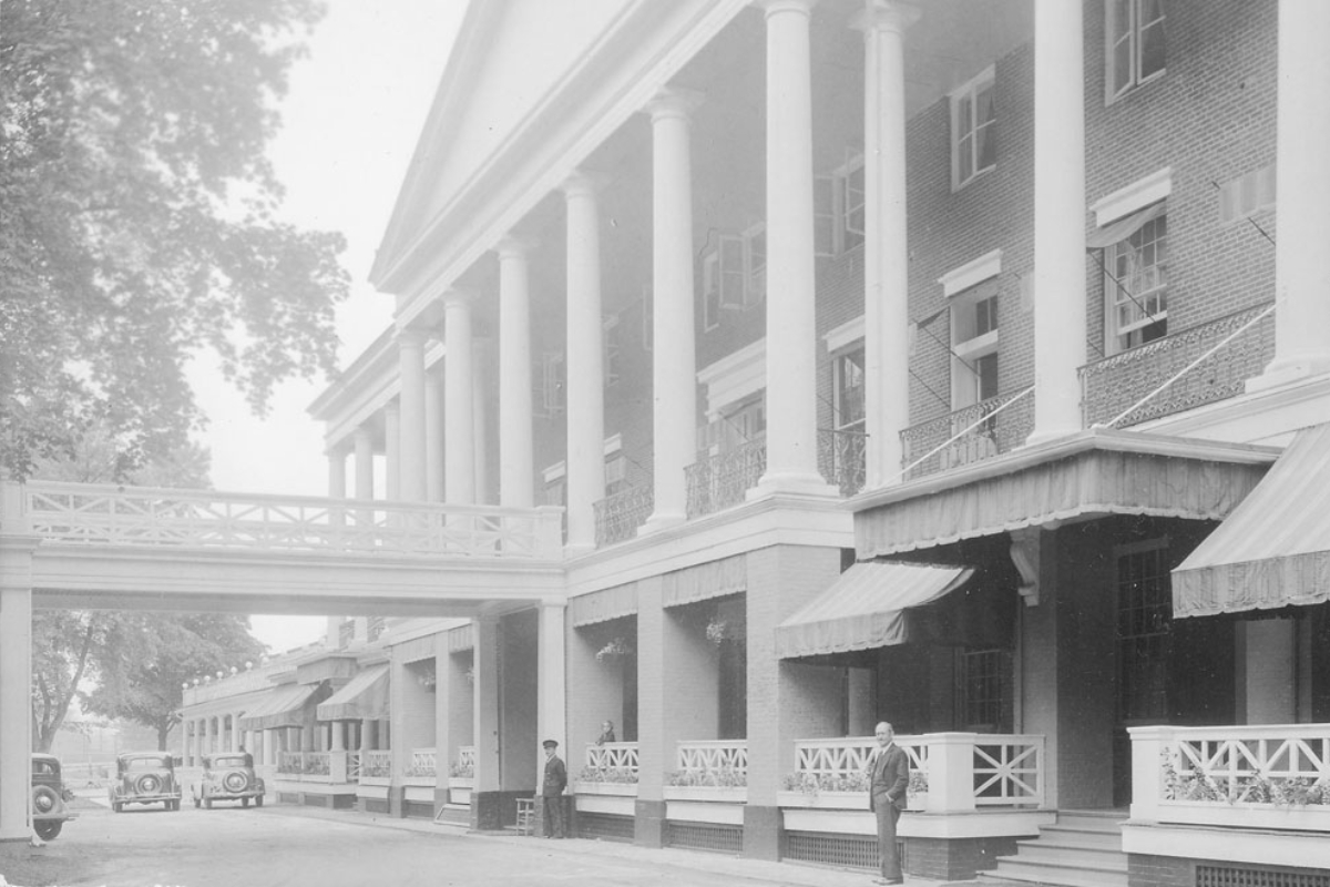 a man standing in front of a building