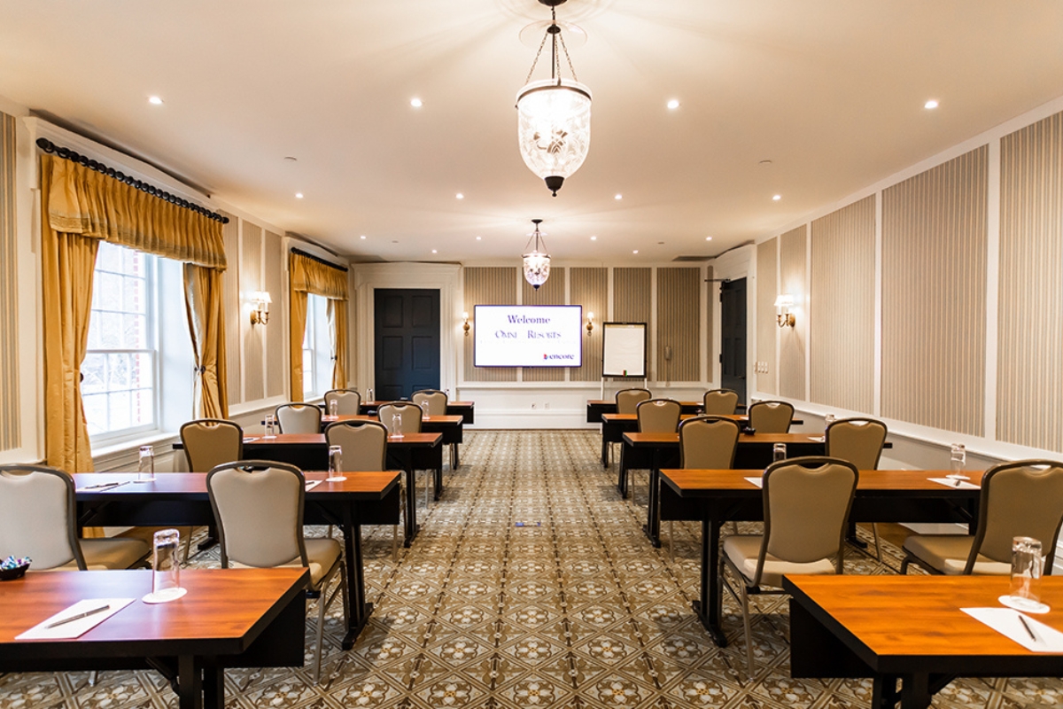 a room with tables and chairs