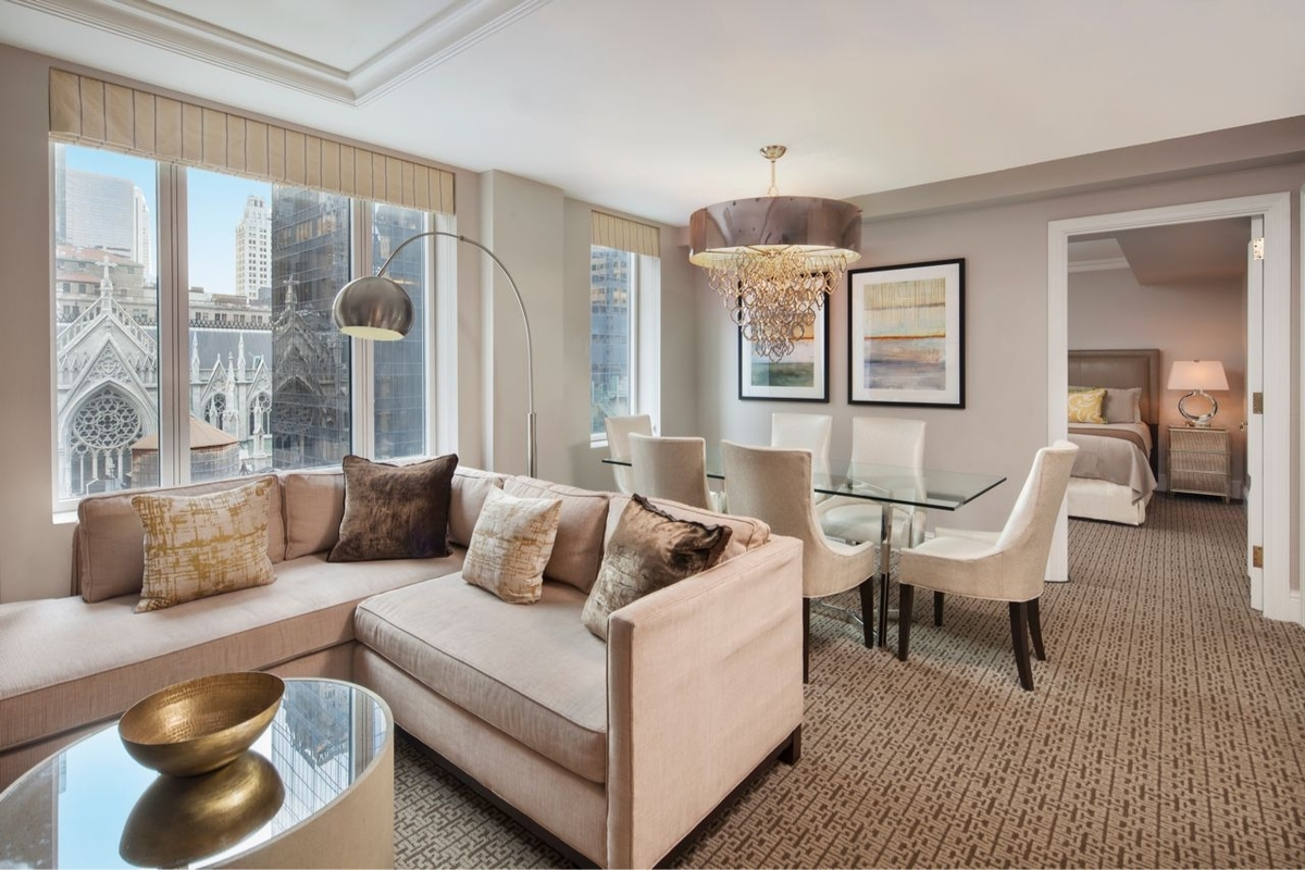 a living room with a couch and a table