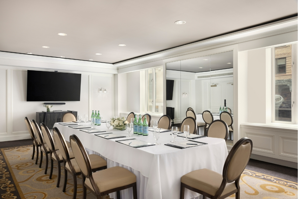 a room with a table and chairs