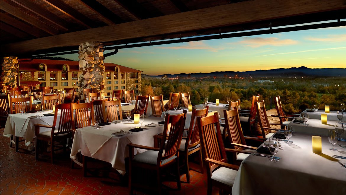 a restaurant with tables and chairs