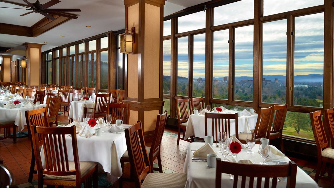 a restaurant with tables and chairs