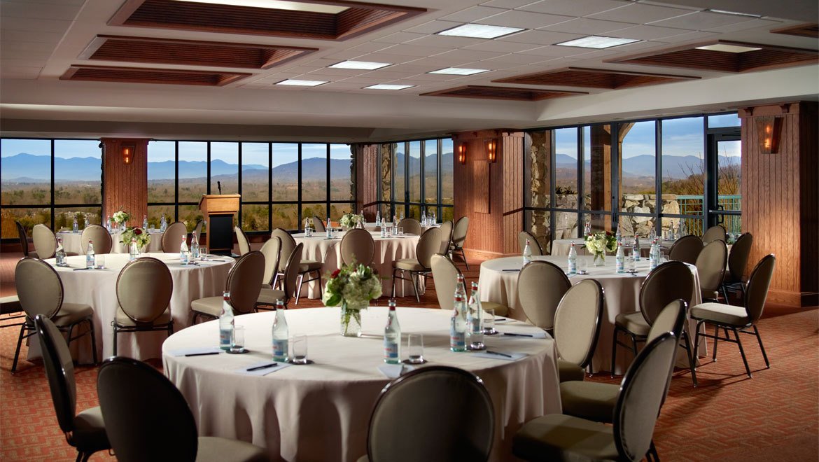 a room with tables and chairs