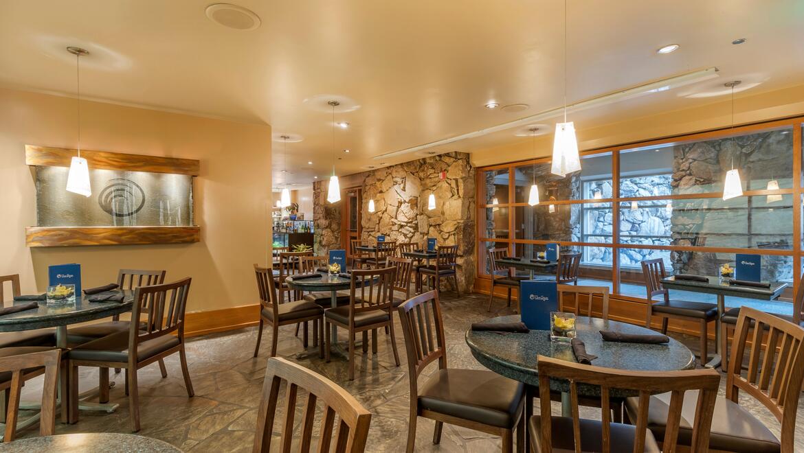 a room with tables and chairs