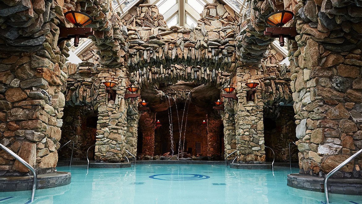 a pool with a waterfall in it