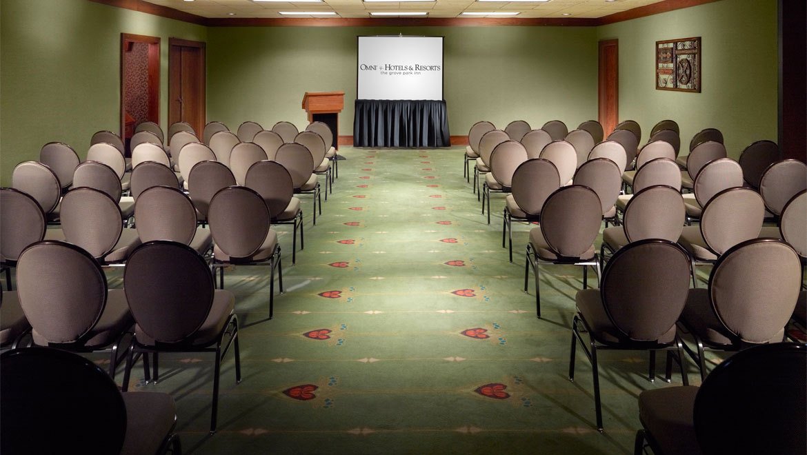 a room with rows of chairs