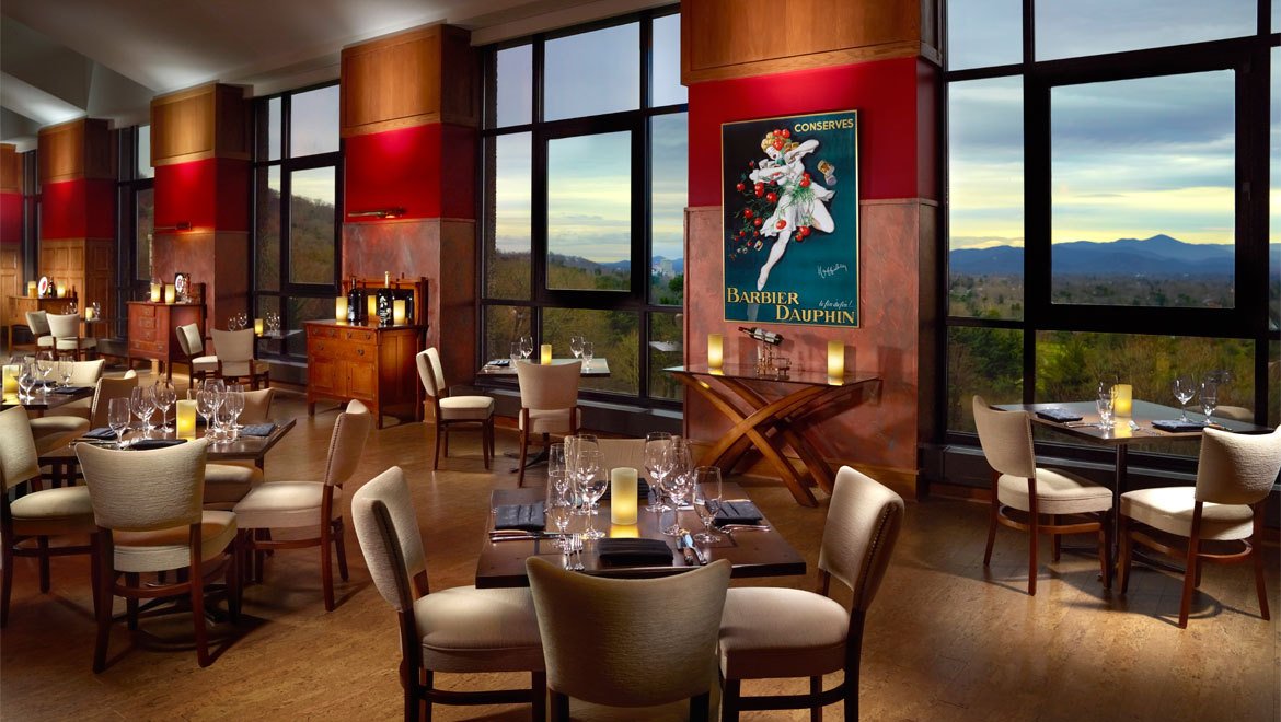 a room with tables and chairs