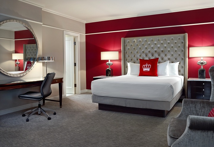 a room with a bed and a desk