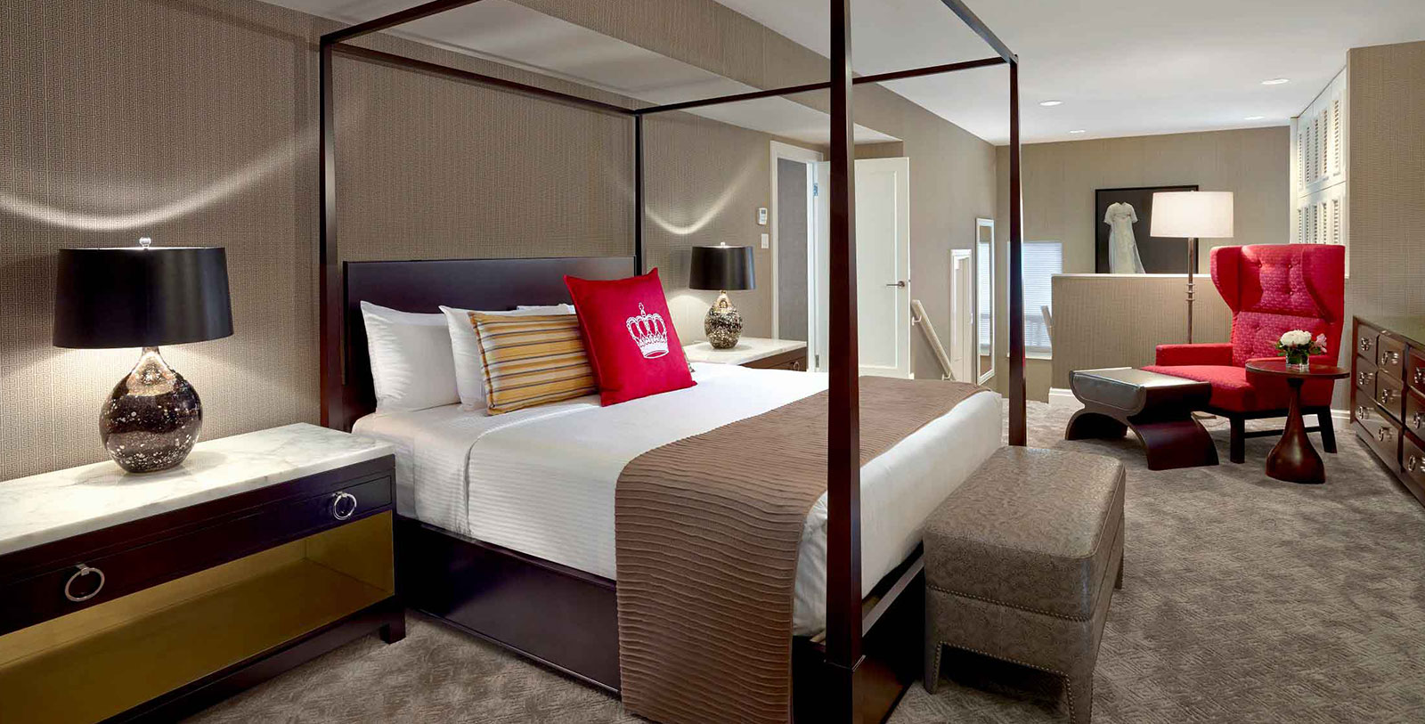 a bed with a four poster bed