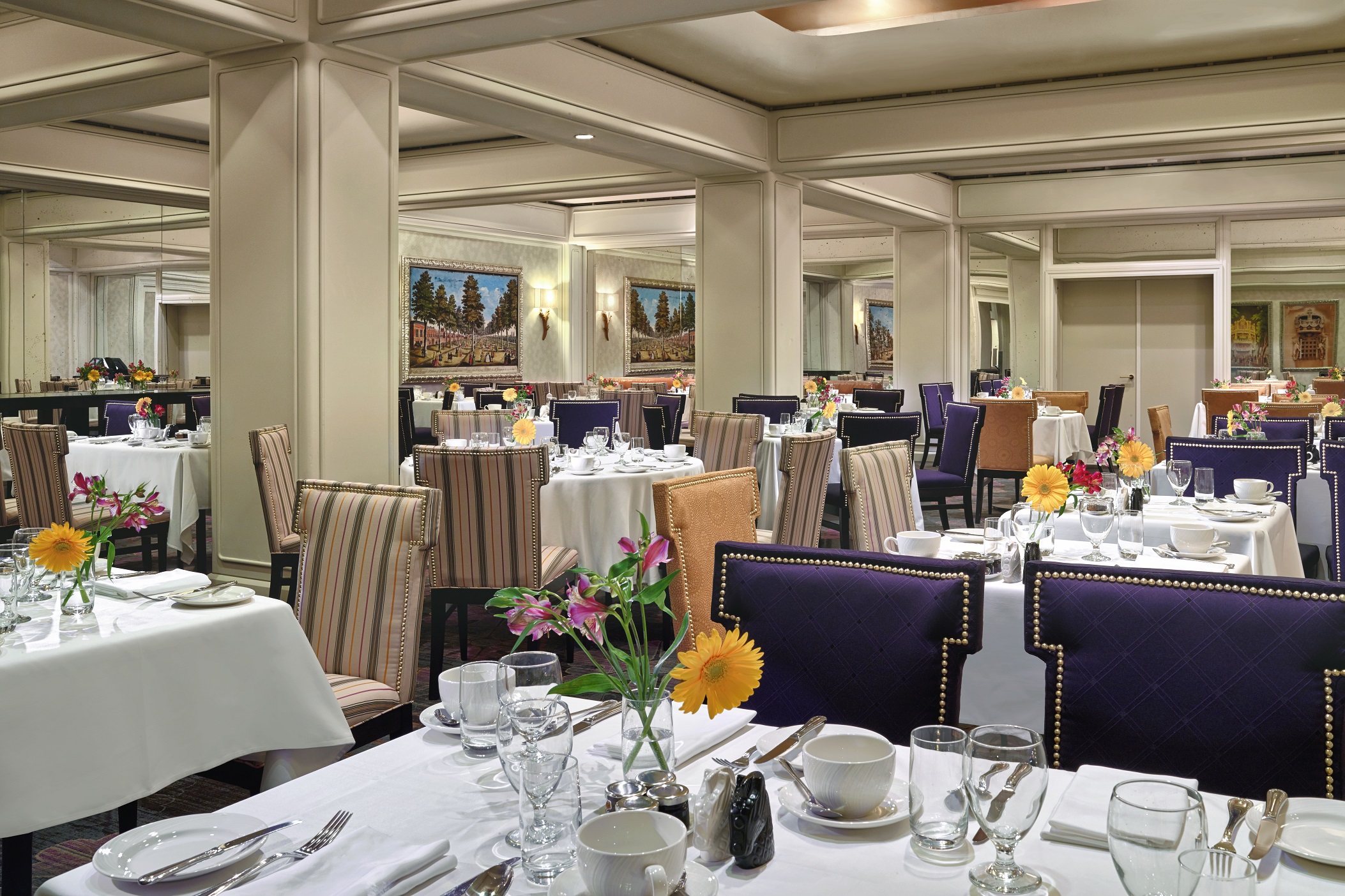 a room with tables and chairs