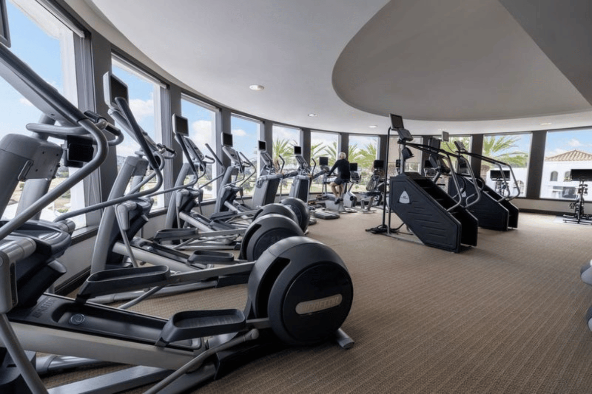 a large room with exercise equipment