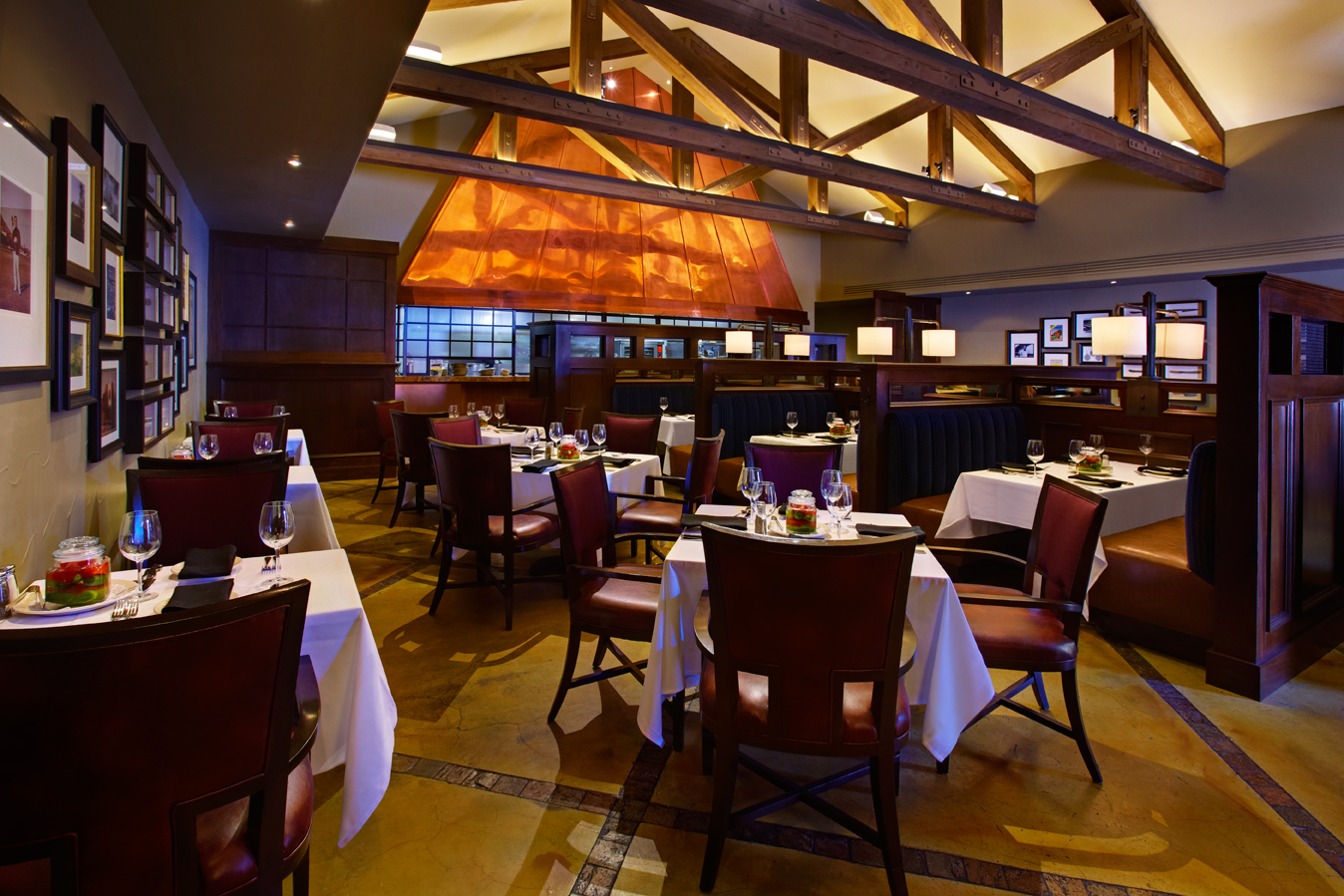 a restaurant with tables and chairs