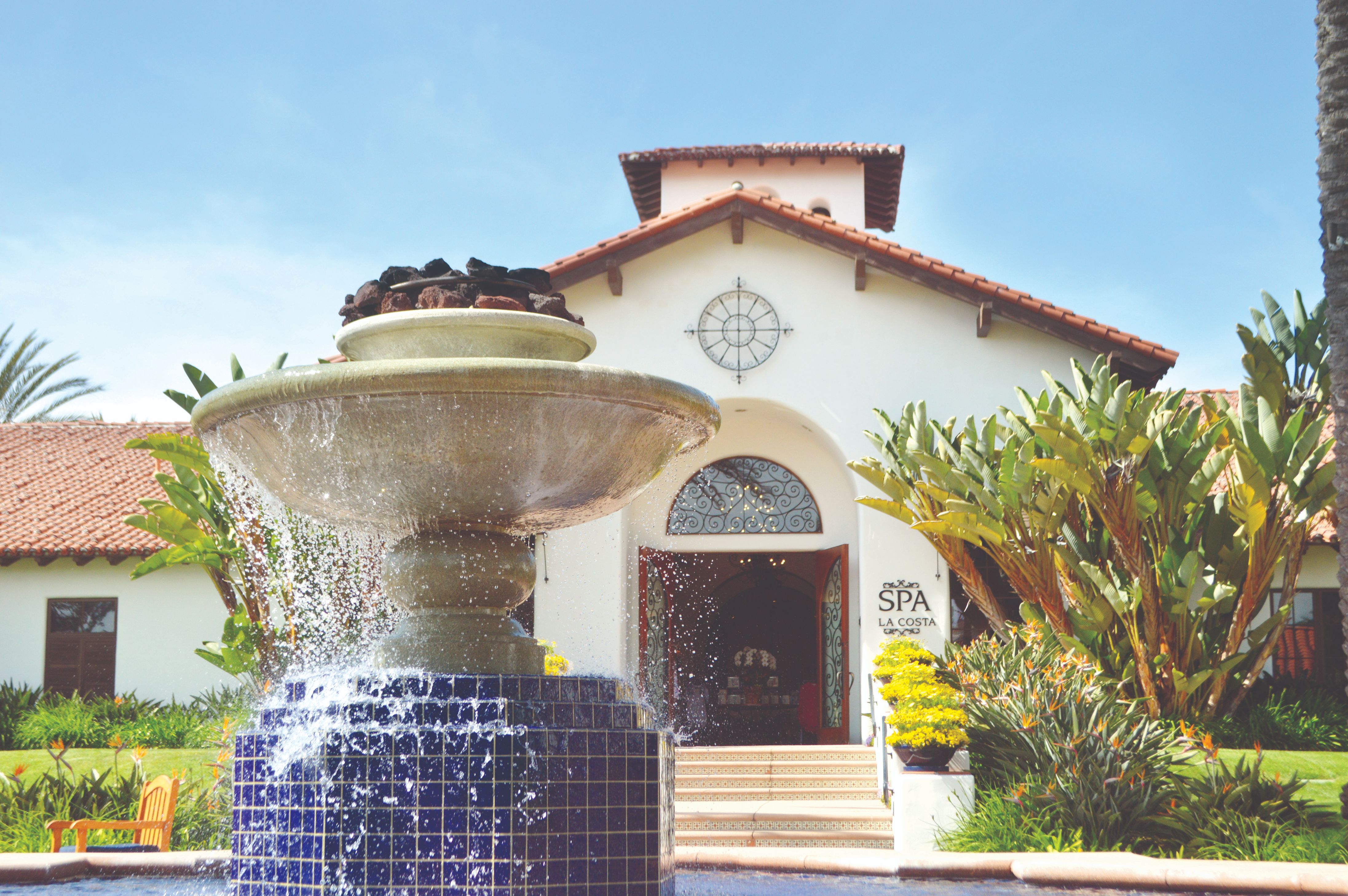 a fountain in front of a building