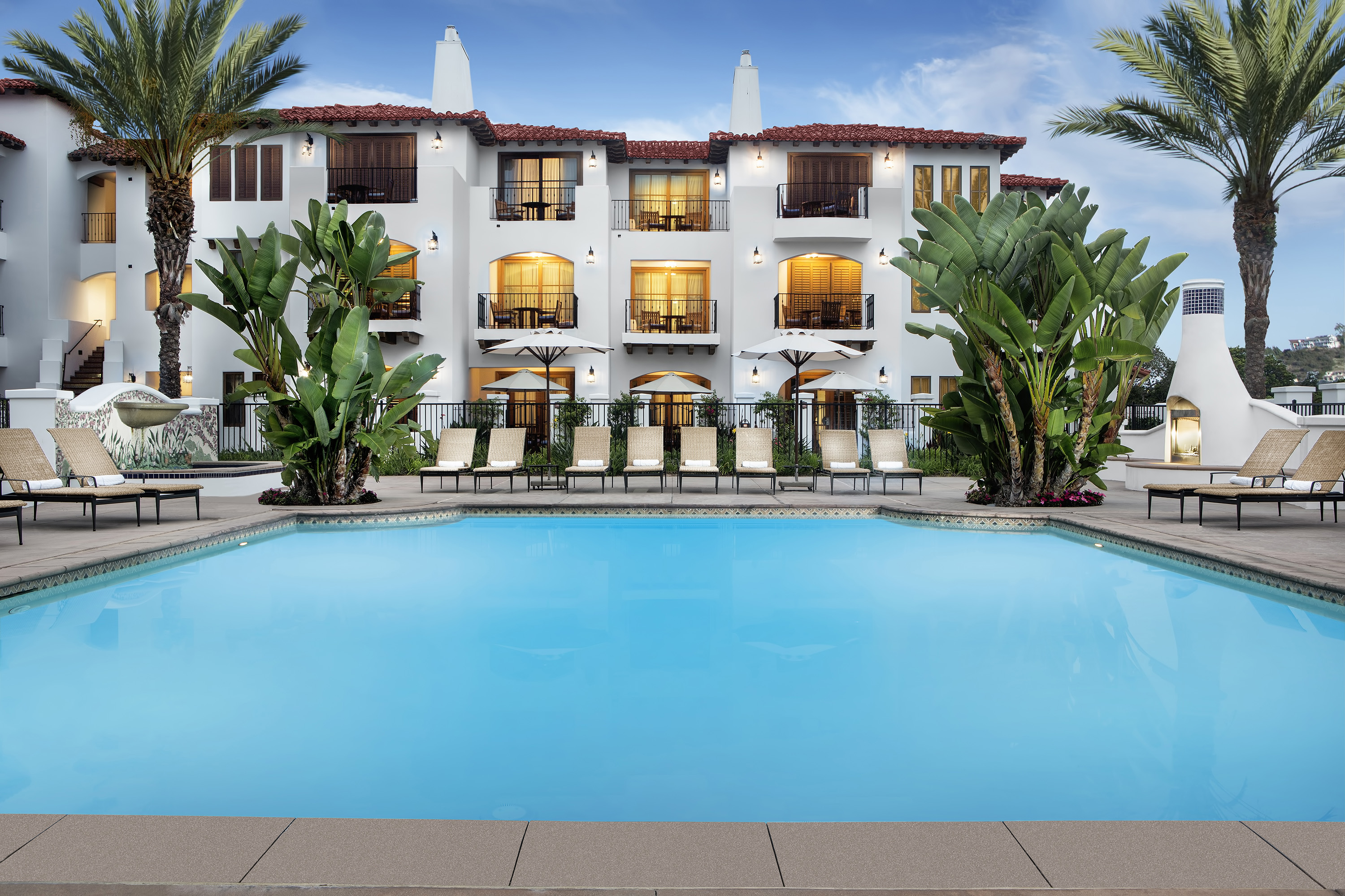 a pool in front of a building